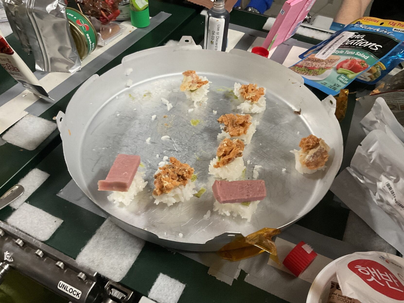 Mouth-watering pictures show astronauts tucking into off-planet sushi